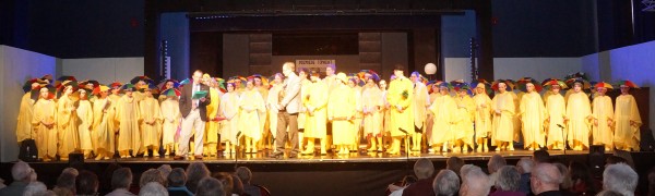 The cast of Ryedale Youth Theatre's excellent production of Singing in the Rain welcome Malton Lions on stage.