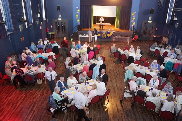 Lion Peter Grice calls the audience to attention as the bingo commences