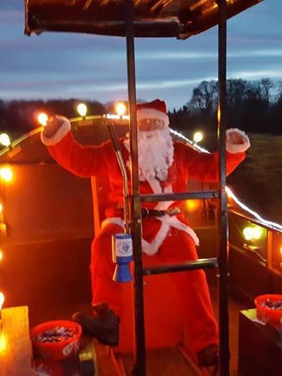 Santa waving portrait